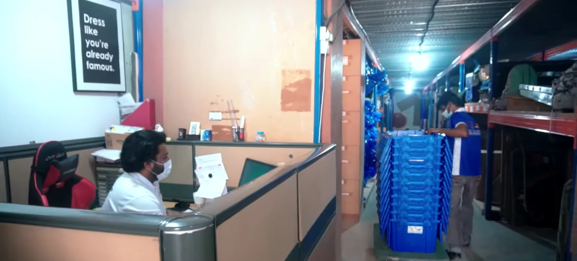 Moving company operations office and warehouse with staff managing relocation logistics in Dubai